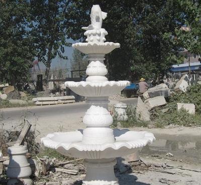 曲陽石雕風水球噴泉 晚霞紅招財擺件的藝術(shù)與風水價值